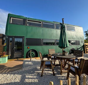 Outside View of the Green Bus on The Hill Holiday Let in Devon